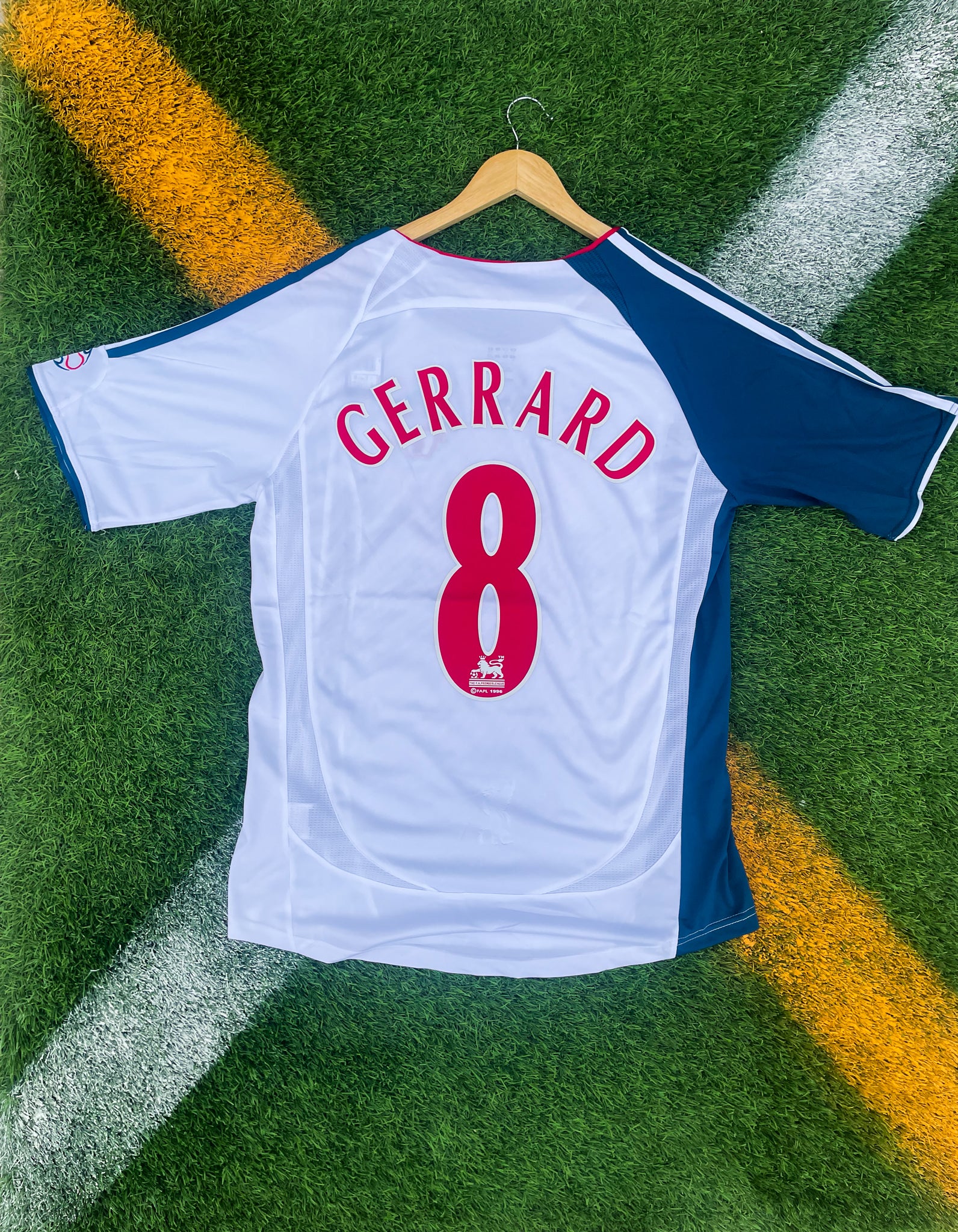 Back view showing Gerrard #8 on Liverpool’s rare white kit

