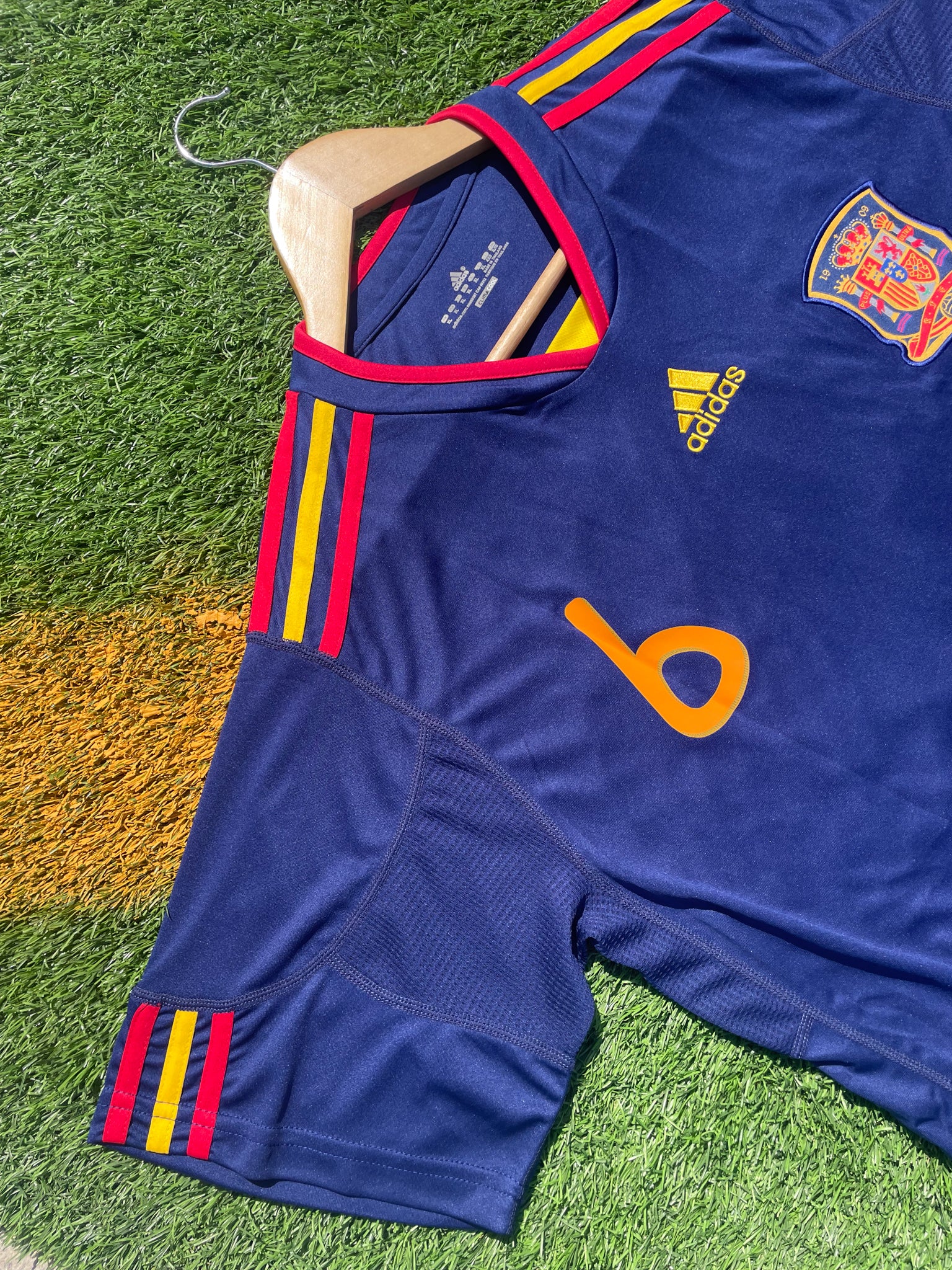 Detail shot of Spain crest and Adidas logo from 2010 Away kit

