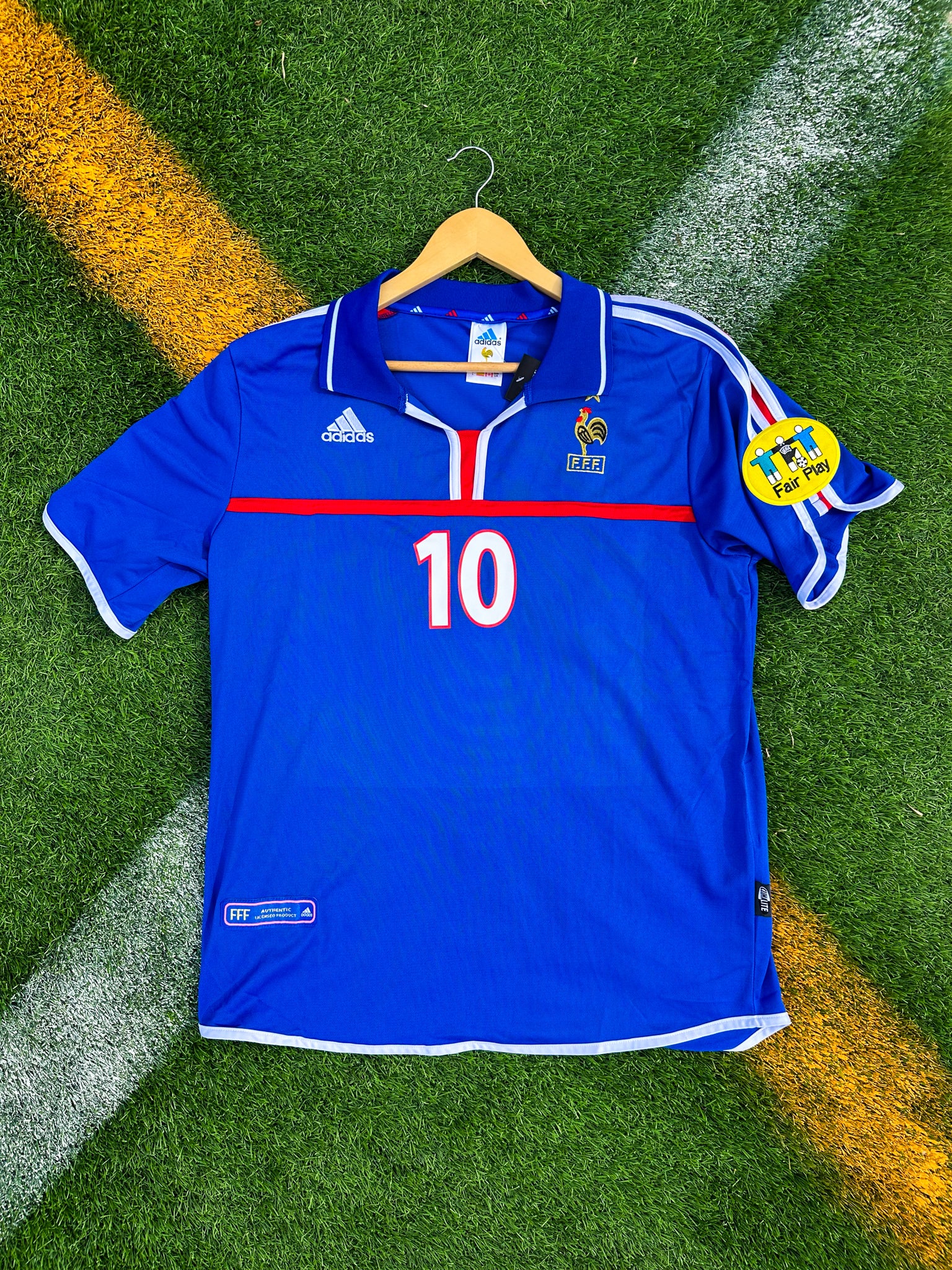 Front view of France 2000 home jersey with traditional blue and sleeve stripes