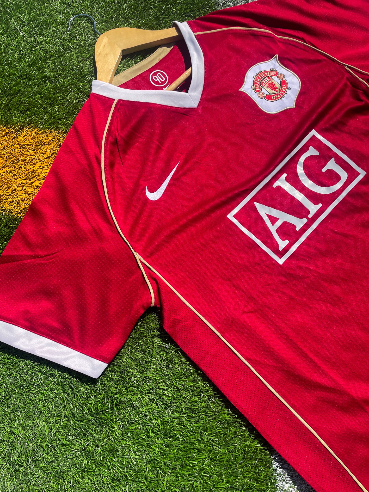 Close-up of Nike swoosh and embroidered crest

