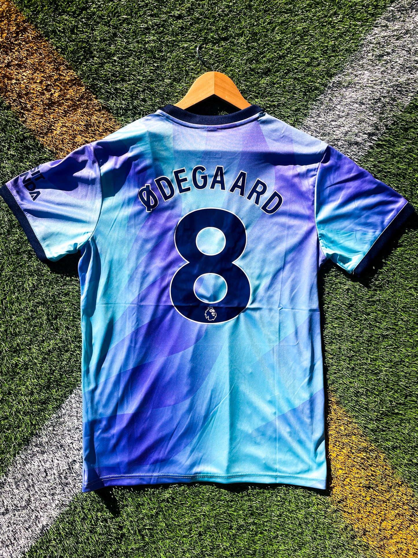 Back view featuring Ødegaard #8 on the Arsenal 2024–2025 third shirt


