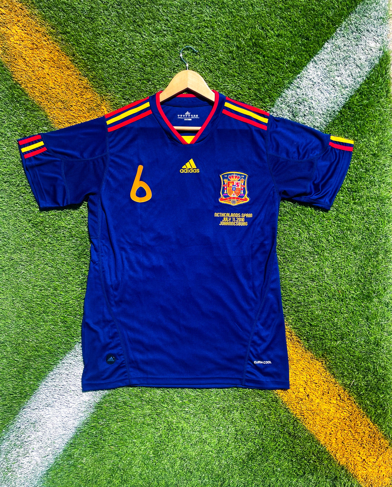 Front view of Spain 2010 Away World Cup Final jersey with Iniesta #6

