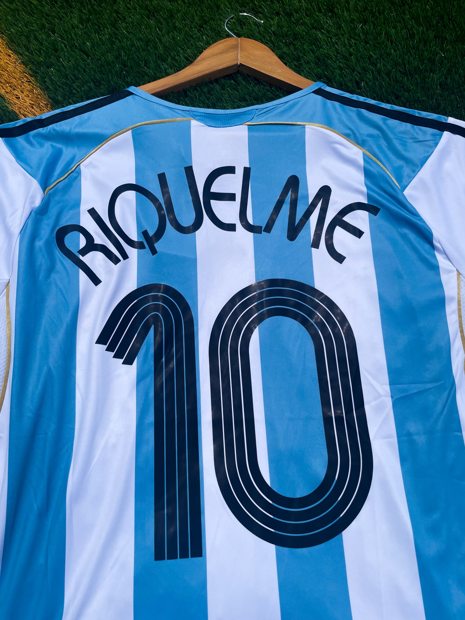 Back view showcasing Riquelme’s name and number 10 on the Argentina 2006 Home Jersey.