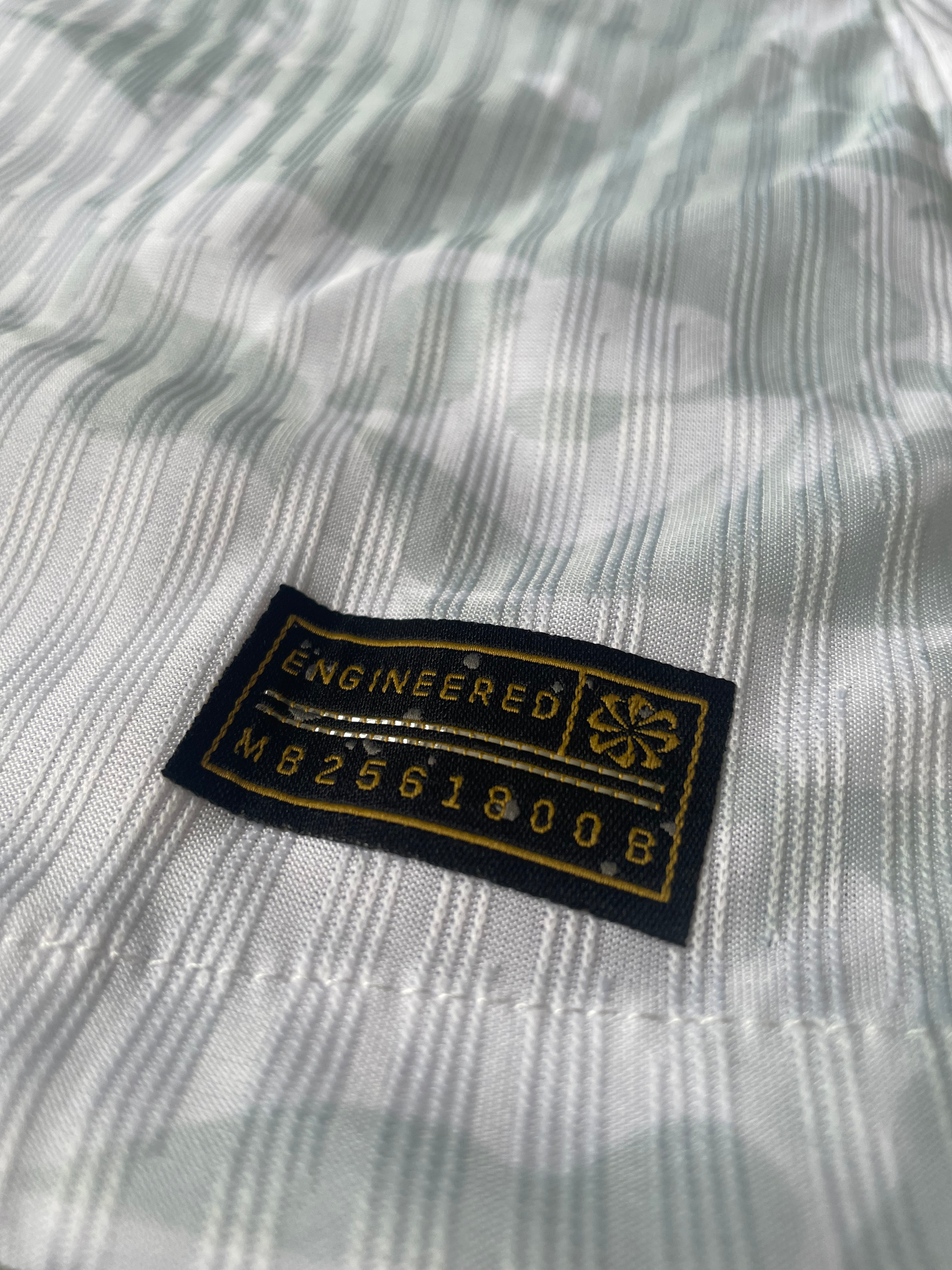 Close-up of Liverpool crest and Premier League Champions badge

