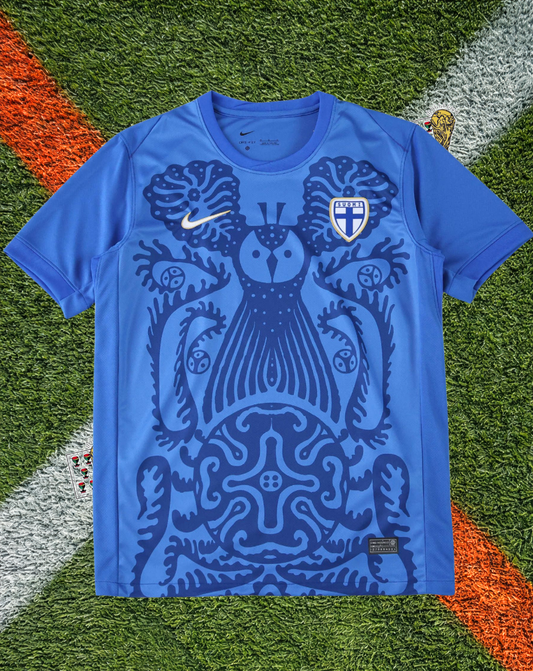Finland 2025/2026 Away Jersey -Nike Royal Blue Eagle-Owl Folk Art Graphic Gold Trim Crew-Neck