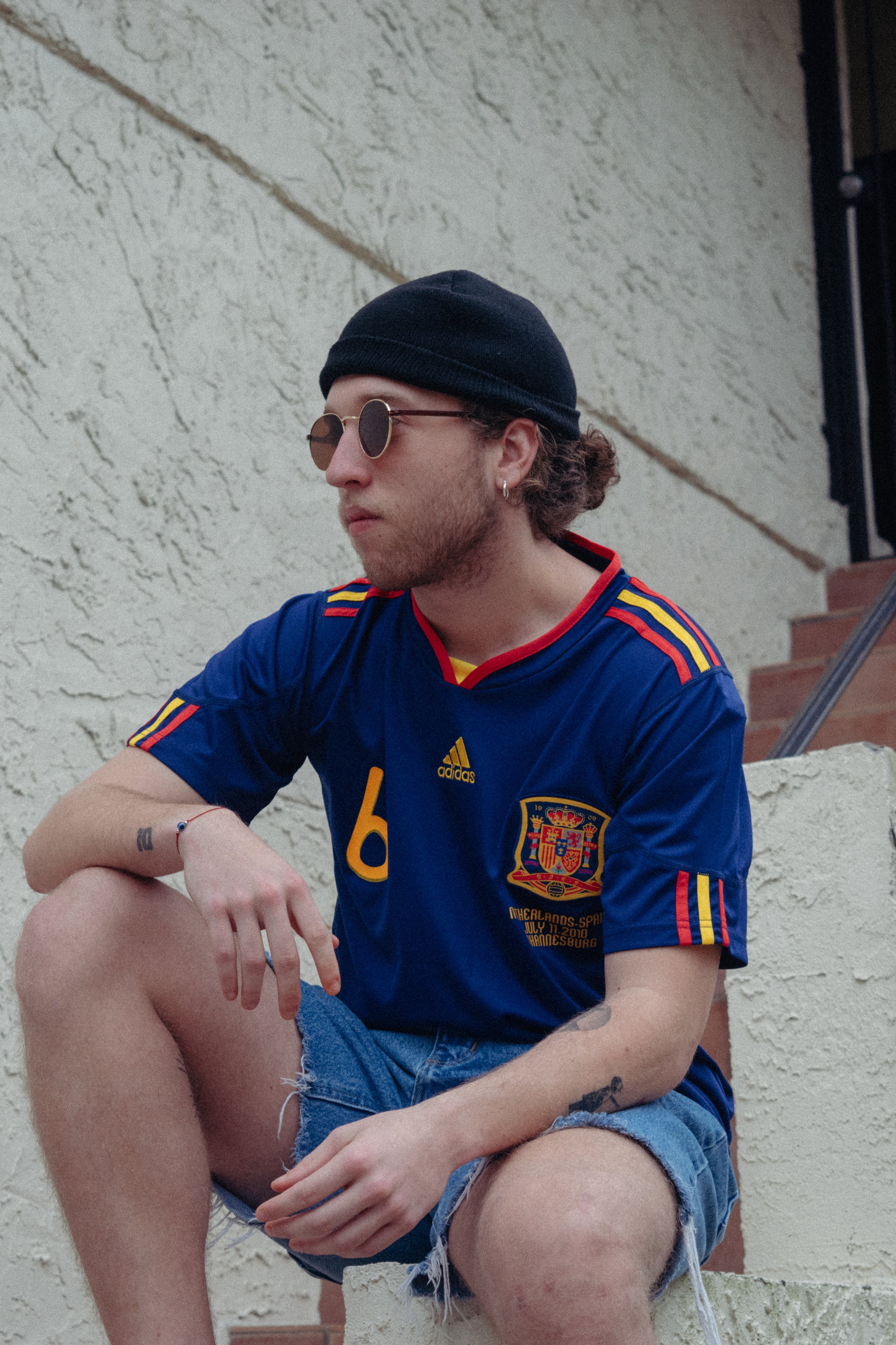 Model wearing Spain 2010 Away Jersey, styled for a modern look