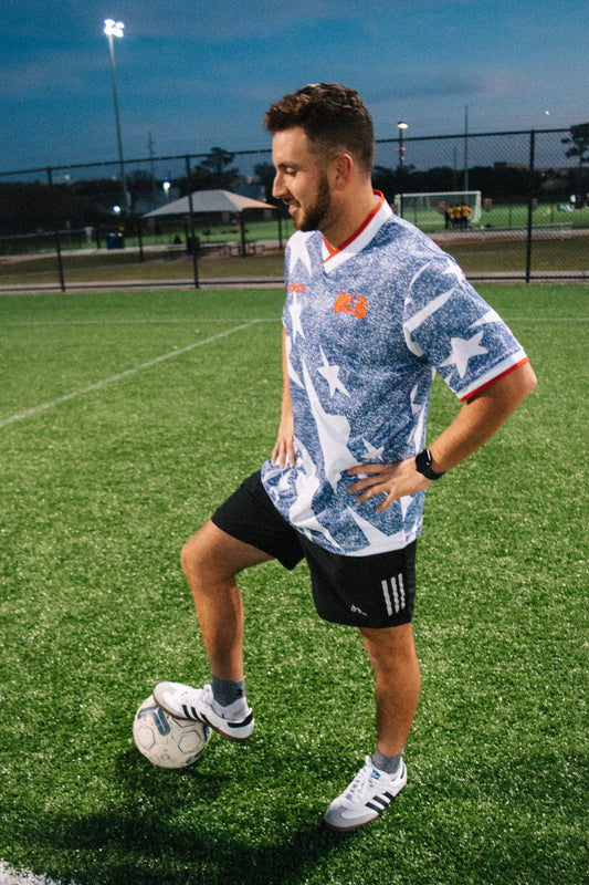 Styled model wearing the USA 1994 grey jersey with retro-inspired outfit

