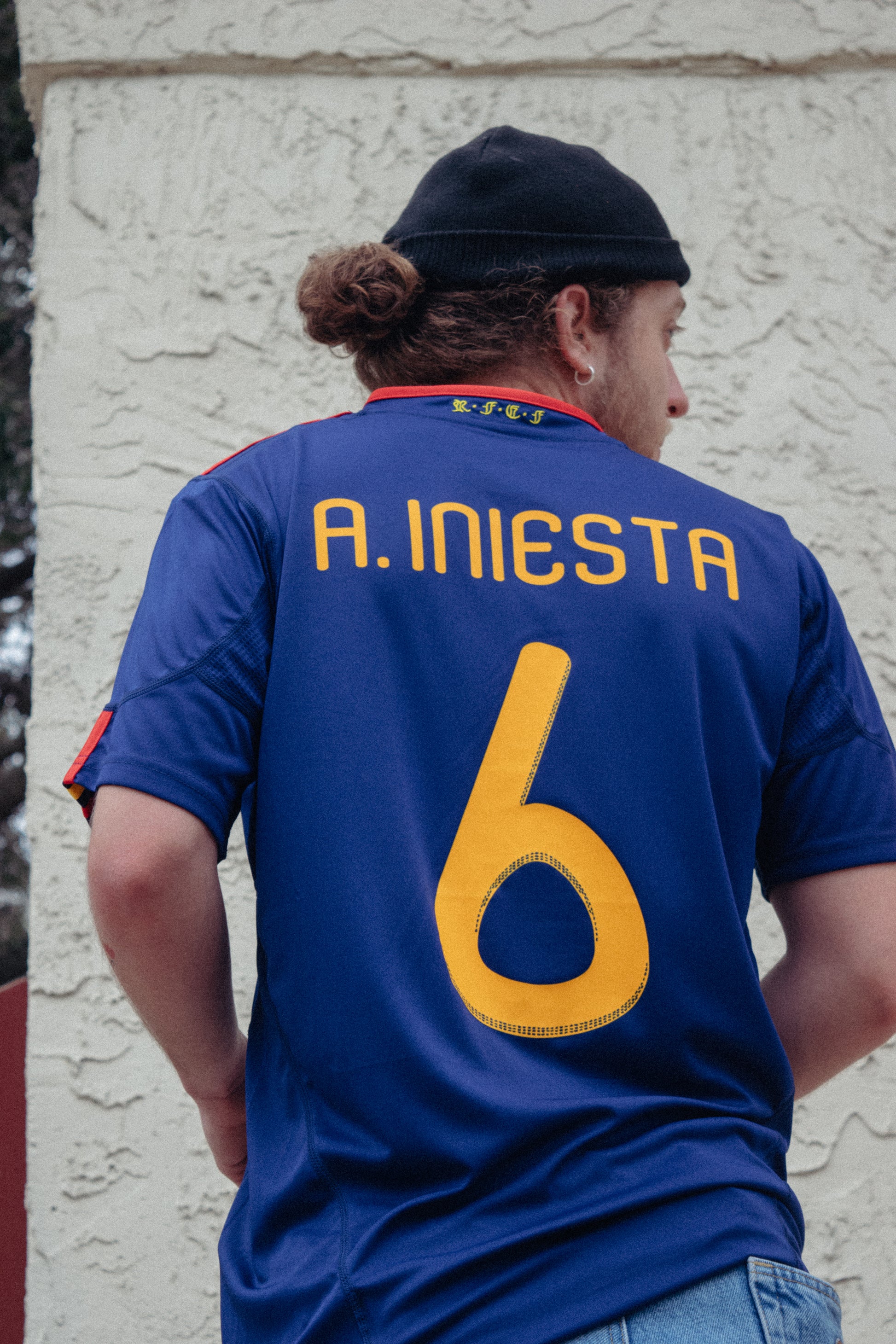Model wearing Spain 2010 Away Jersey, styled for a modern look


