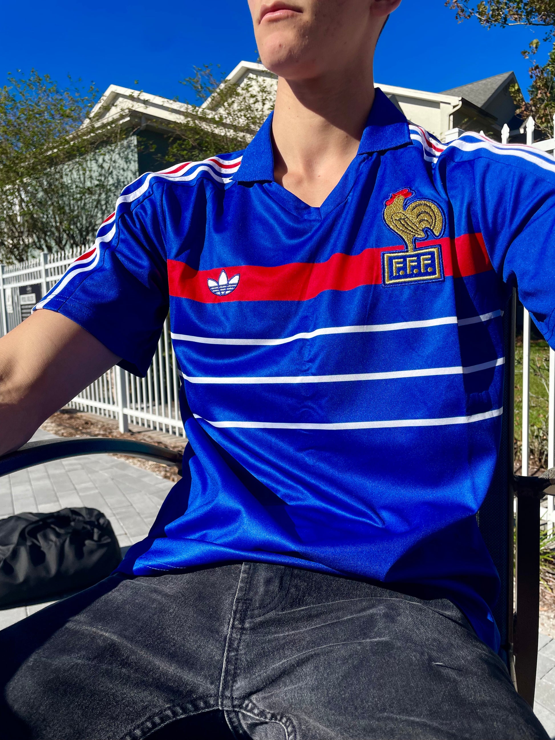 Styled shot of France 1986 home jersey displayed or worn

