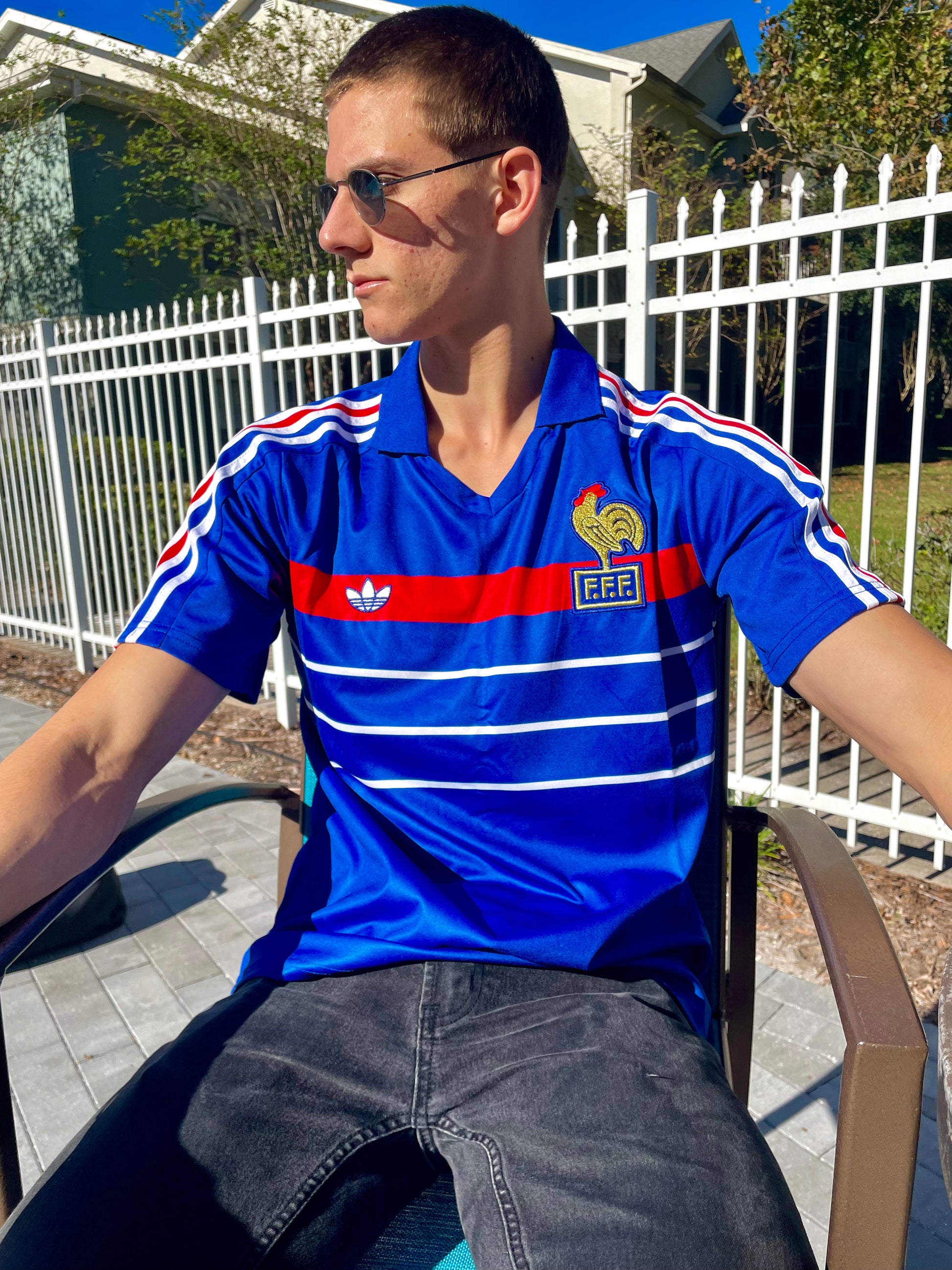 Styled shot of France 1986 home jersey displayed or worn

