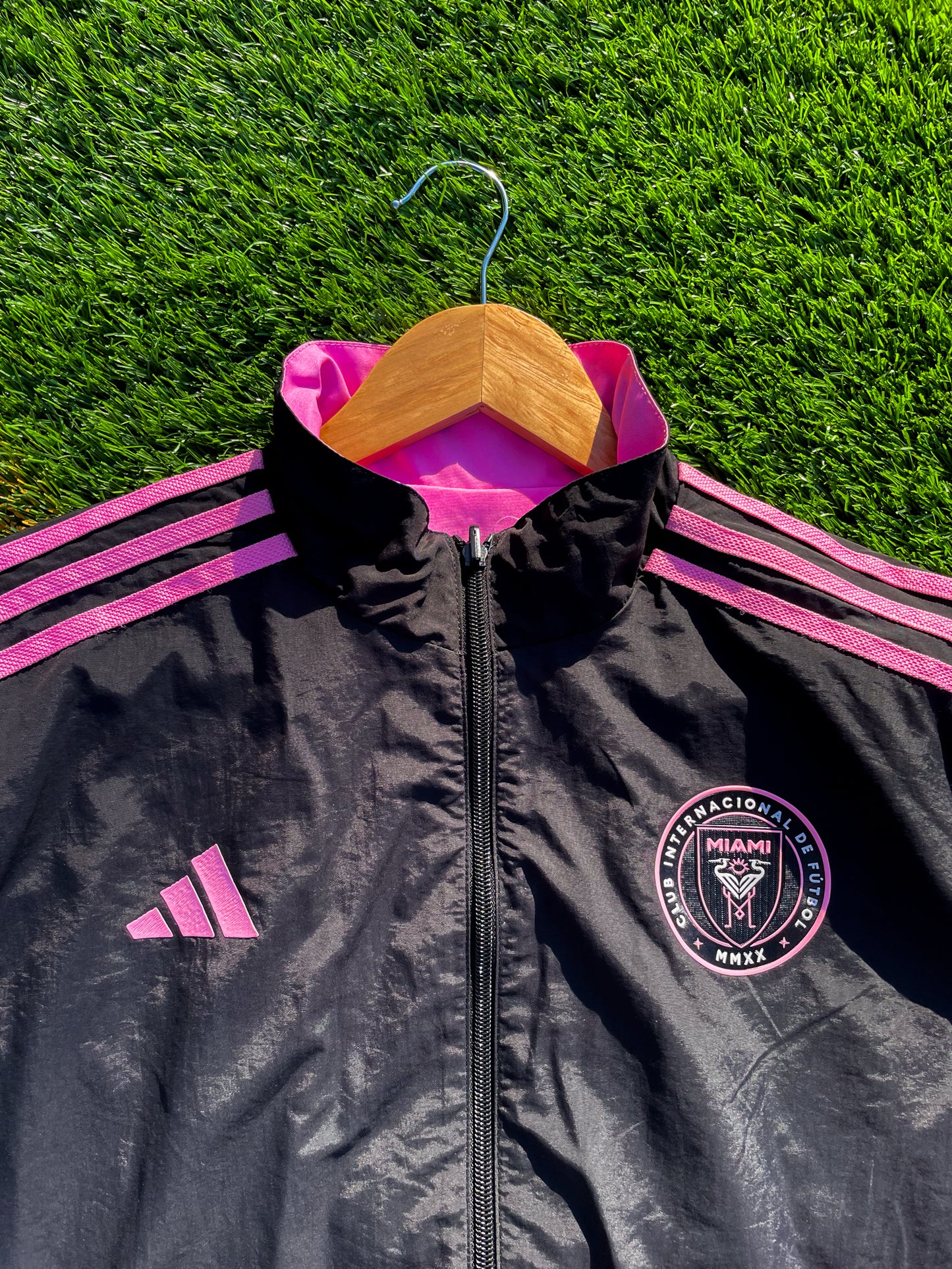 Close-up of Inter Miami logo and fabric texture on pink side

