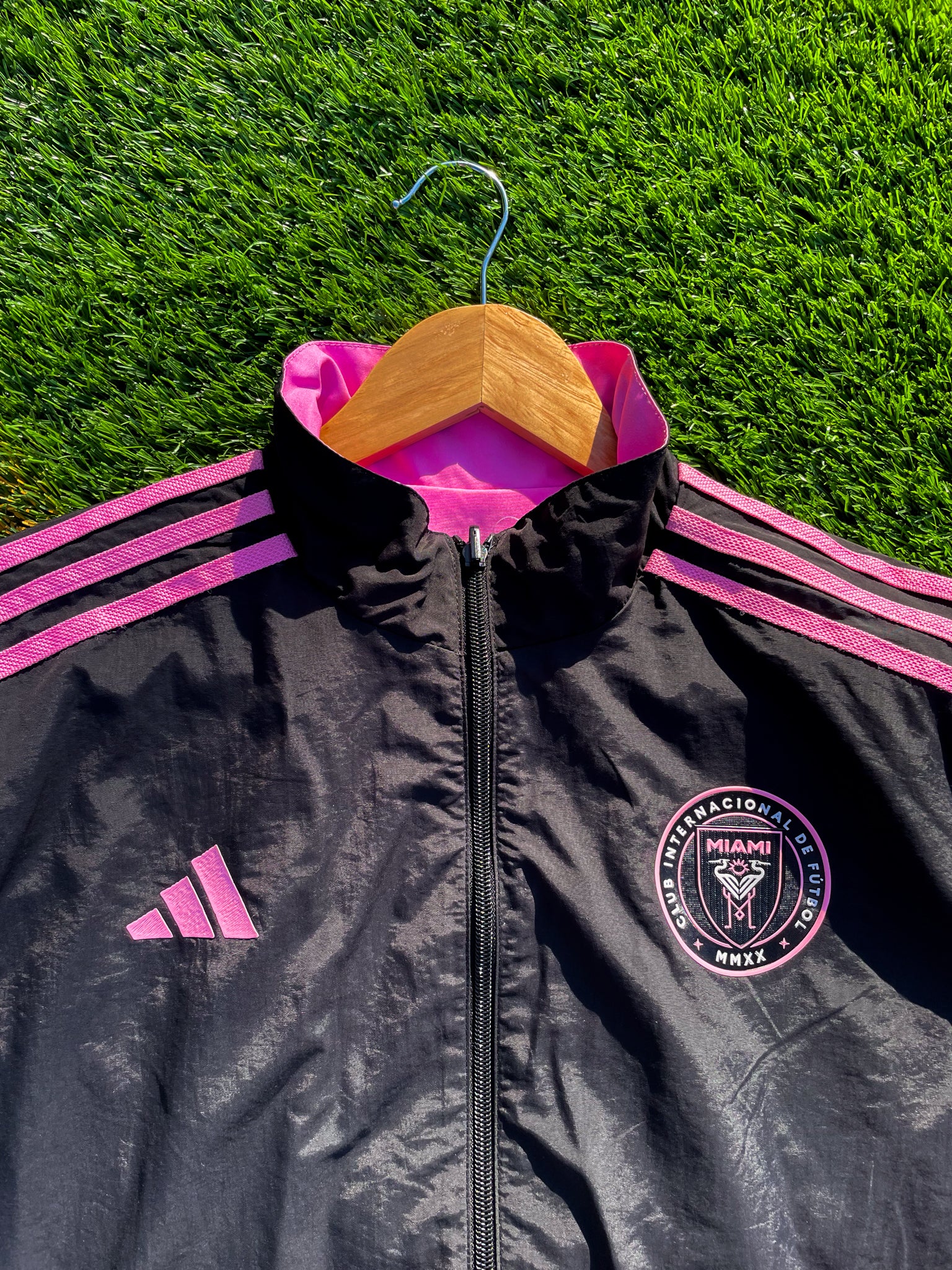 Close-up of Inter Miami logo and fabric texture on pink side

