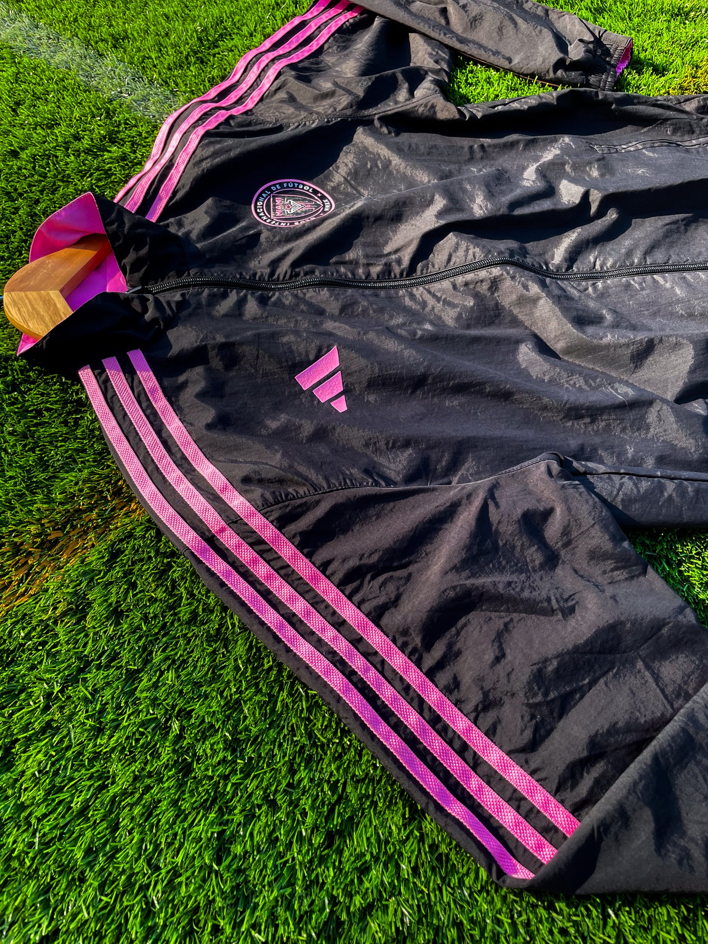 Close-up of Inter Miami logo and fabric texture on pink side

