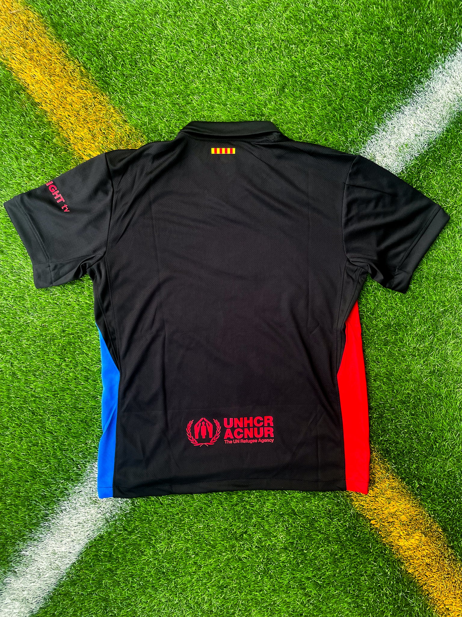 Back view of Barcelona 2024/25 away jersey with Nike logo and club crest, inspired by Cactus Jack streetwear aesthetics