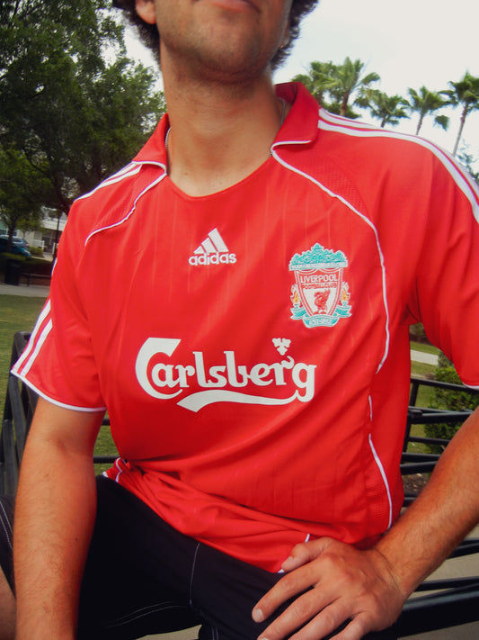 Styled shot of Liverpool 2006 Gerrard kit in a modern streetwear outfit

