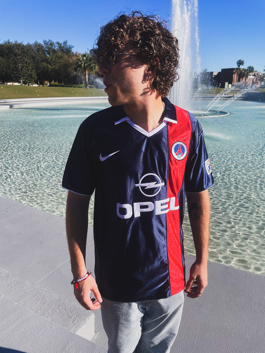 Modeled streetwear-style shot of the vintage PSG jersey

