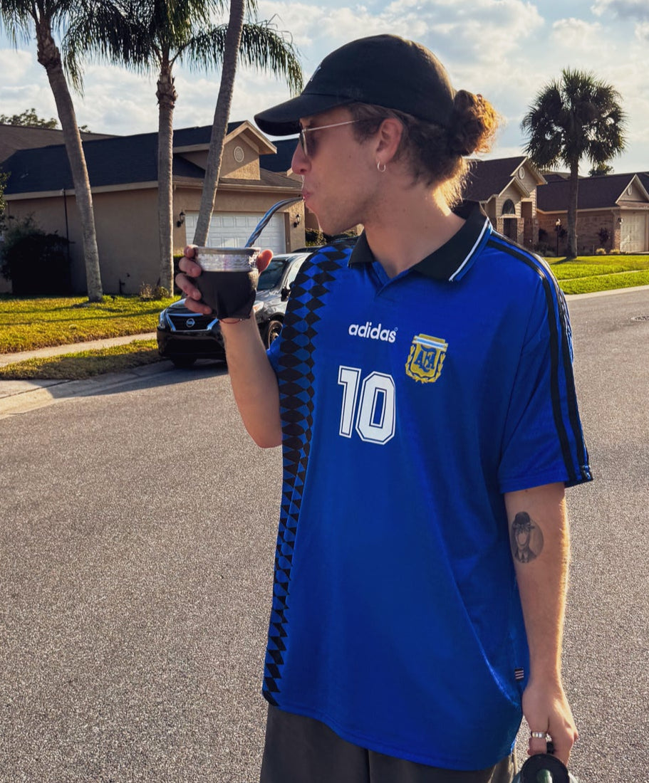 Model wearing Argentina 1994 Away Maradona #10 vintage Adidas soccer jersey