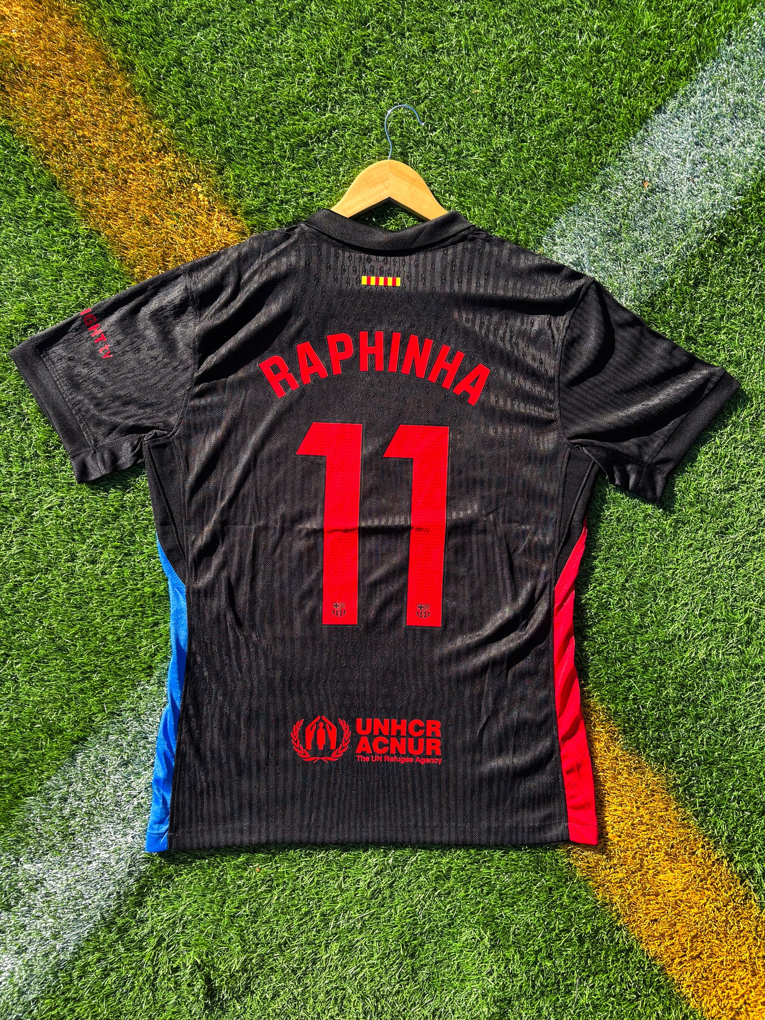 Back view of Barcelona 2024/25 away jersey with Nike logo and club crest, inspired by Cactus Jack streetwear aesthetics