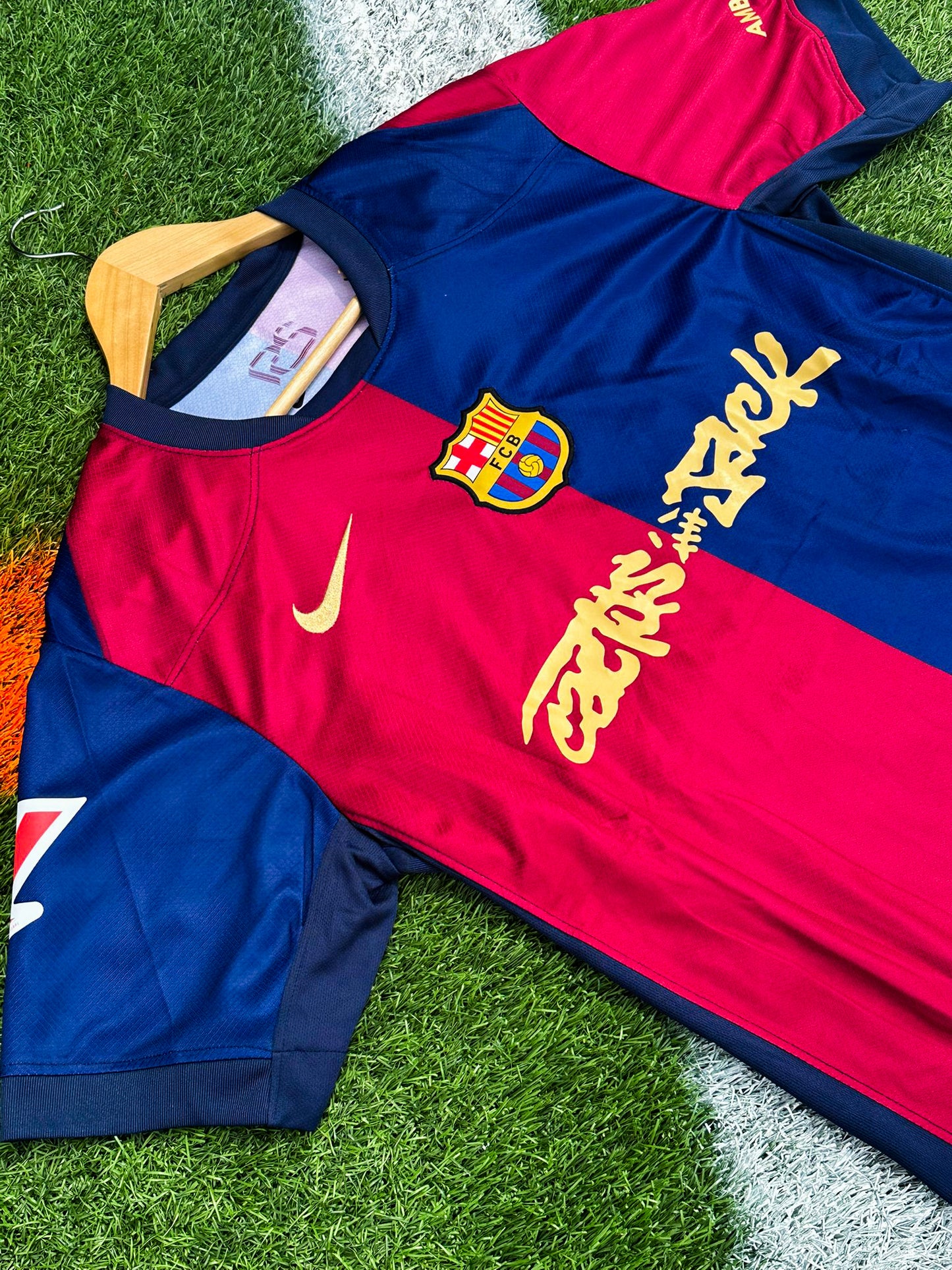 Close-up of Cactus Jack and Nike detailing on the Barcelona 2024/25 Home kit

