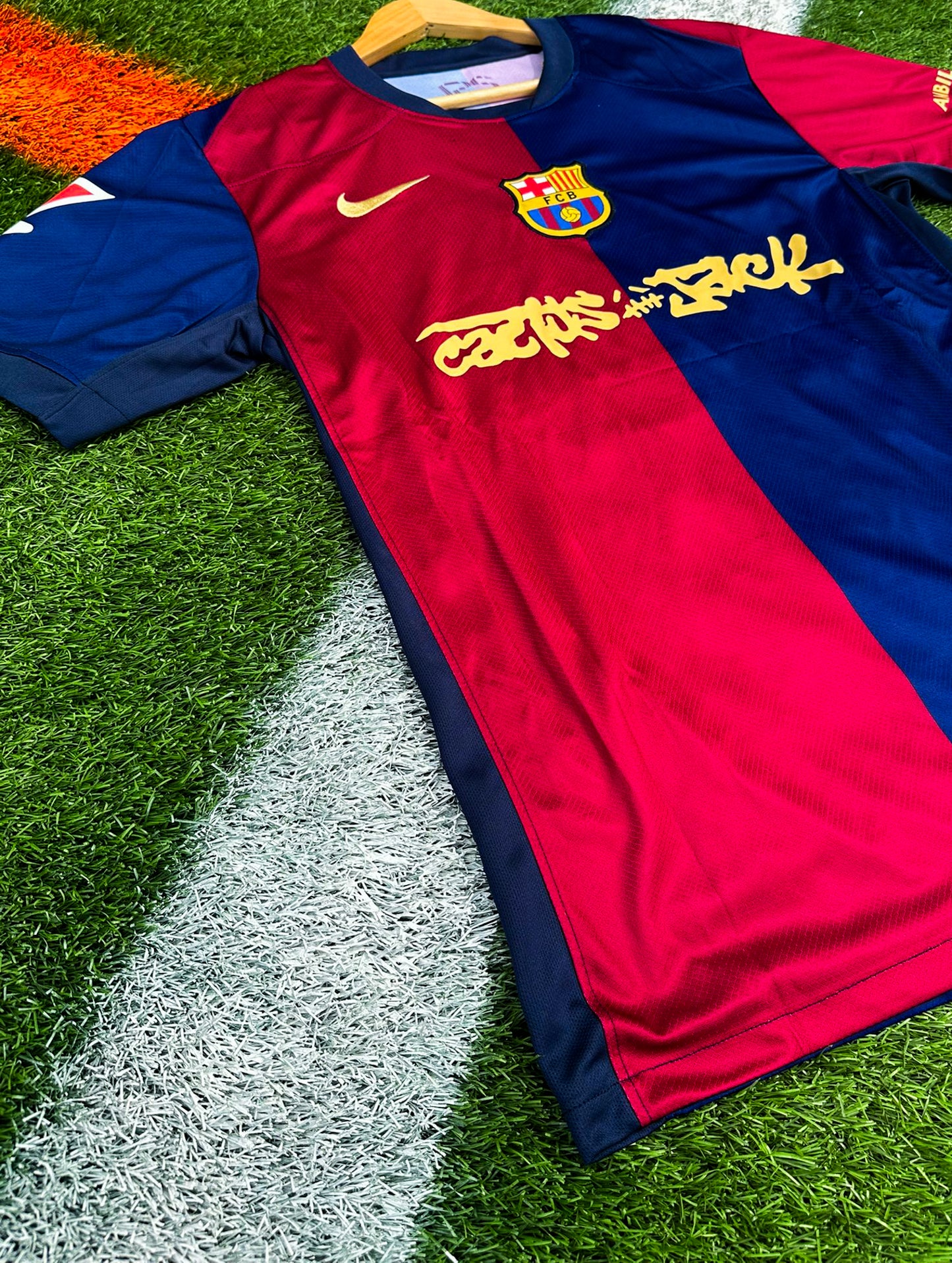 Close-up of Cactus Jack and Nike detailing on the Barcelona 2024/25 Home kit

