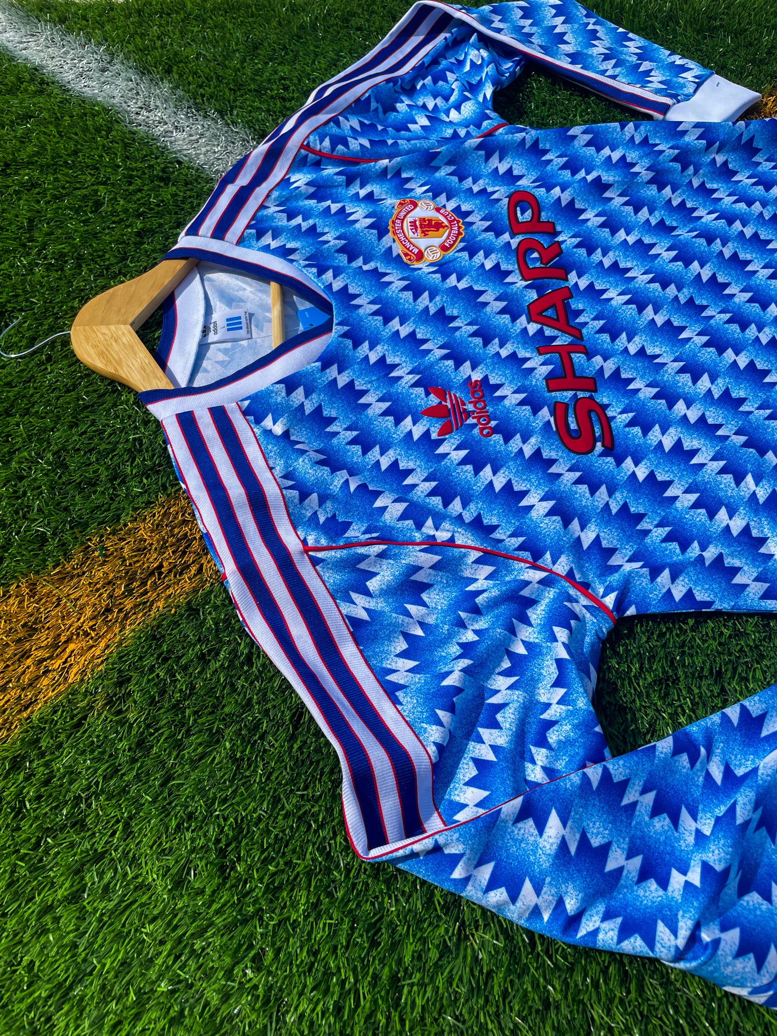 Front view of the vintage Adidas jersey design

