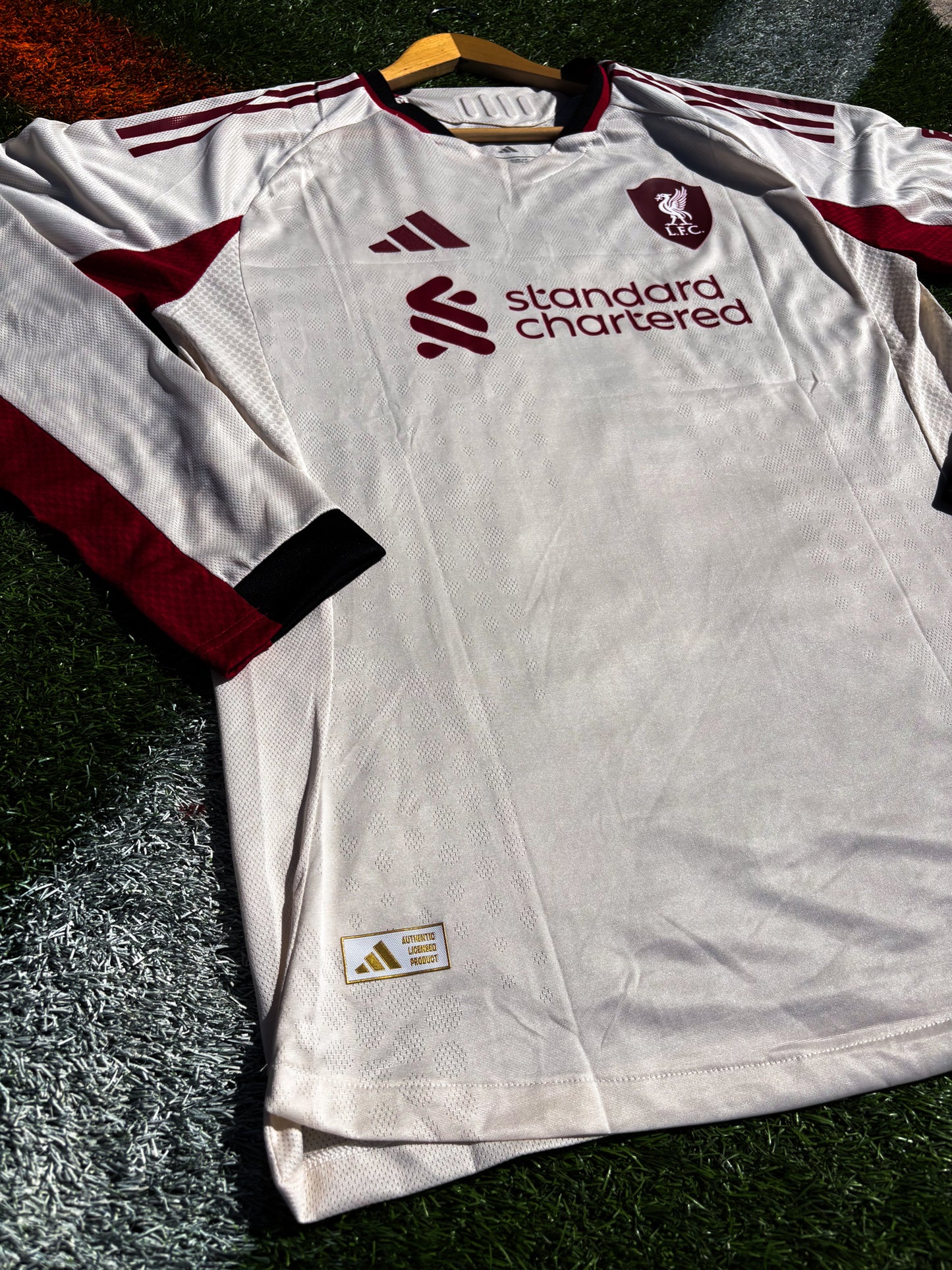 Liverpool 2025–26 Away Jersey  – Cream Off‑White with Red & Black Trim