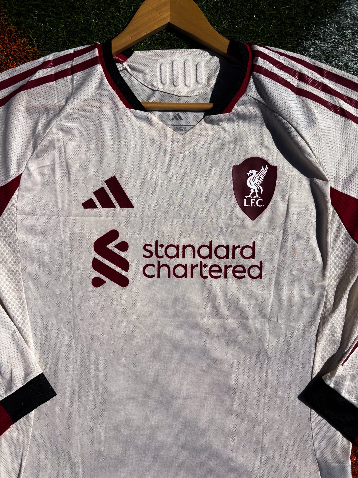 Liverpool 2025–26 Away Jersey  – Cream Off‑White with Red & Black Trim
