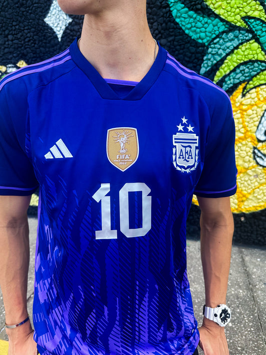 Model wearing Argentina 2023 Away Messi #10 Jersey styled for streetwear.