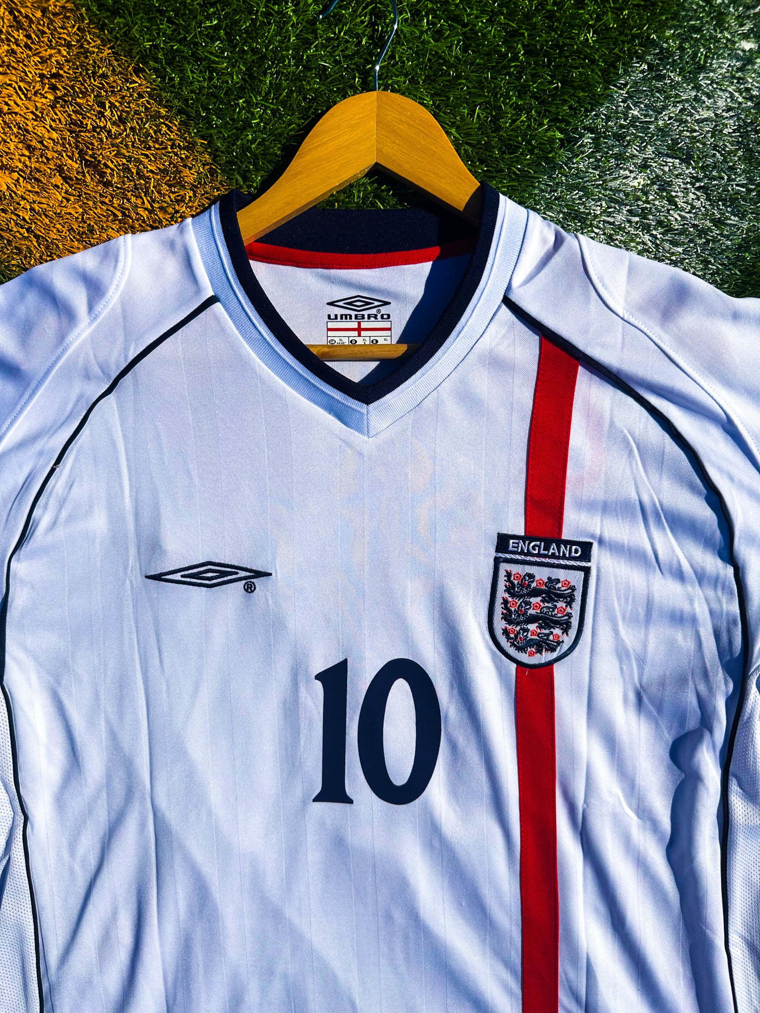 Close-up of the England crest and jersey fabric details.