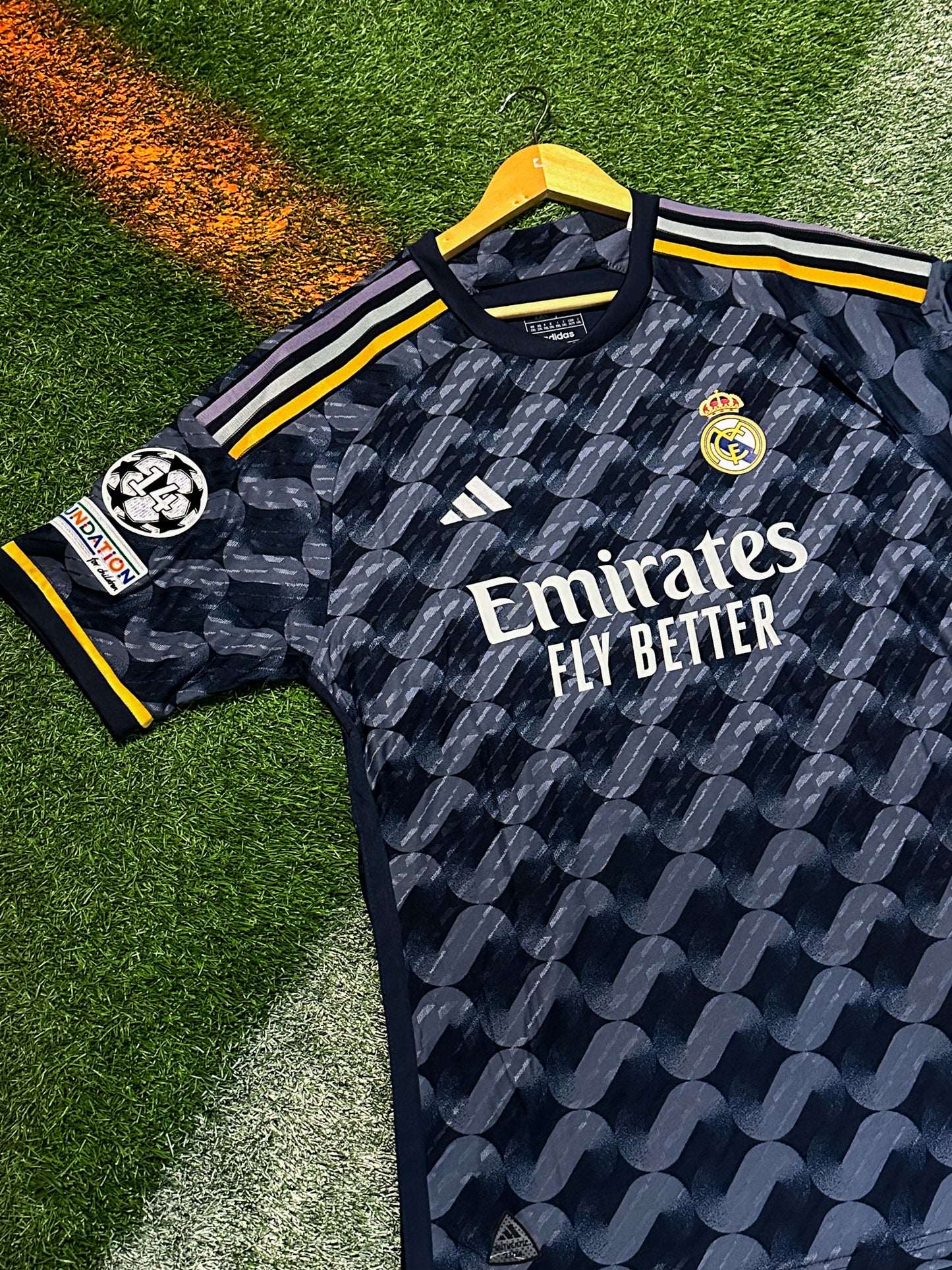 Real Madrid 2023/2024 Away Jersey – Vini Jr 7- Navy & Gold Champions league Kit