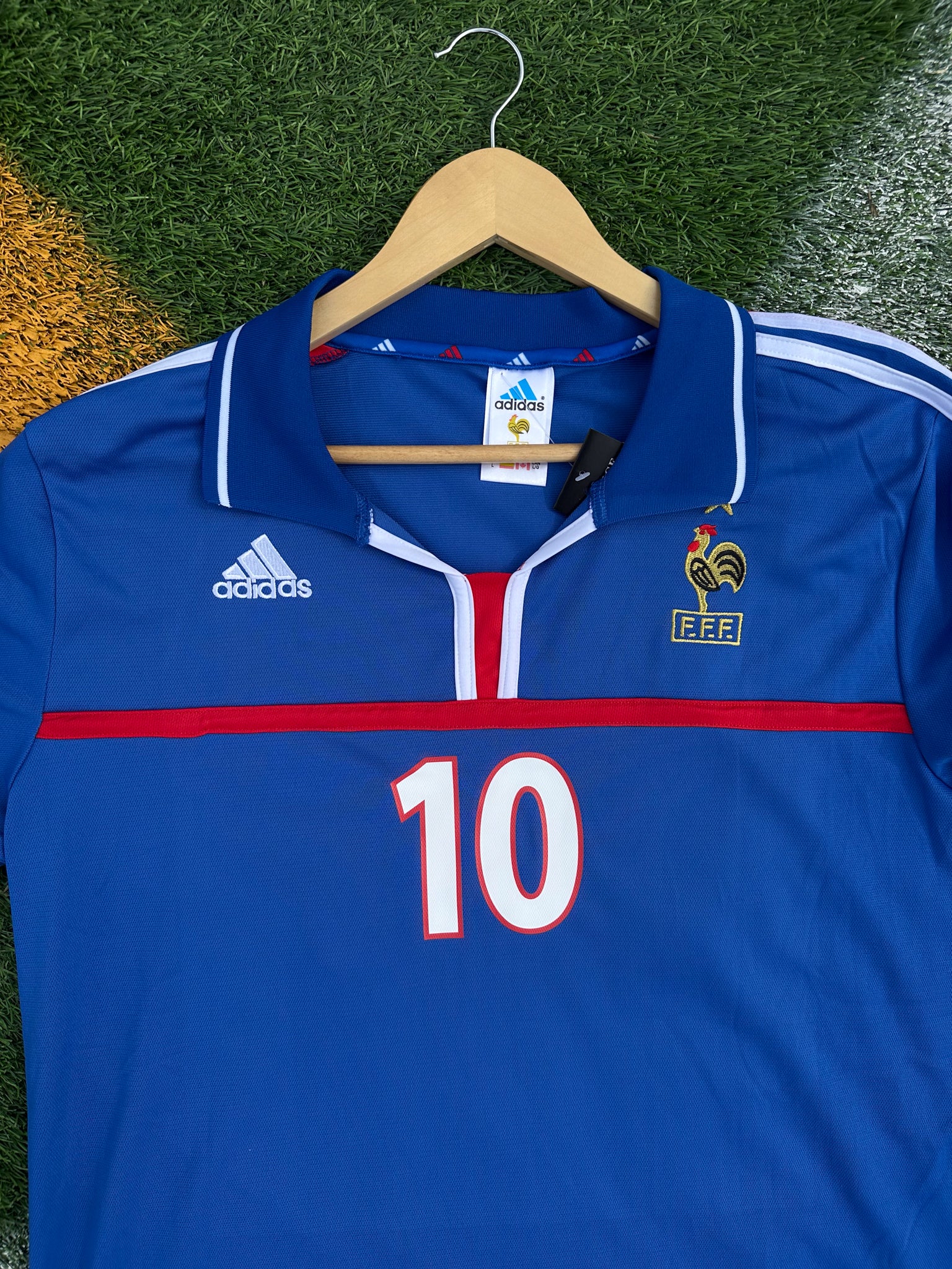 Detail of the FFF crest and Adidas logo

