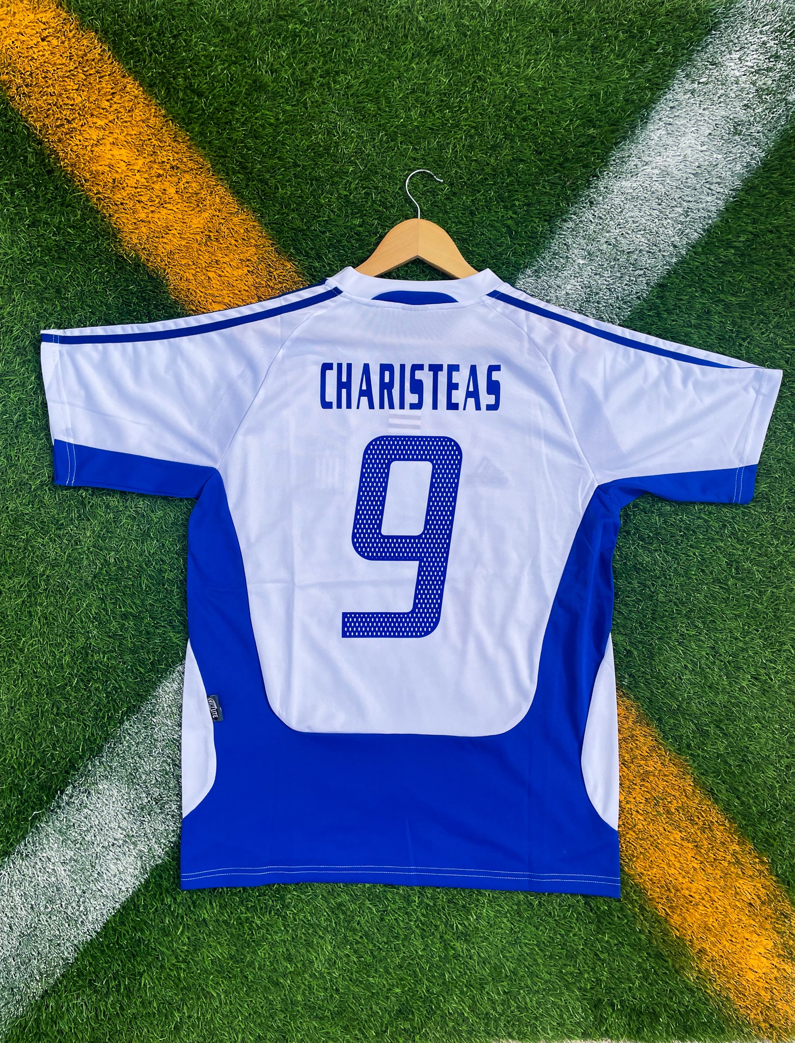 Back of the jersey featuring Charisteas #9

