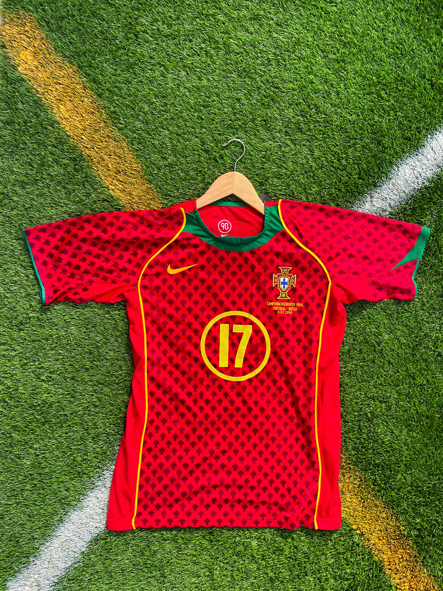 Front of Portugal 2004 home jersey with red and gold detailing

