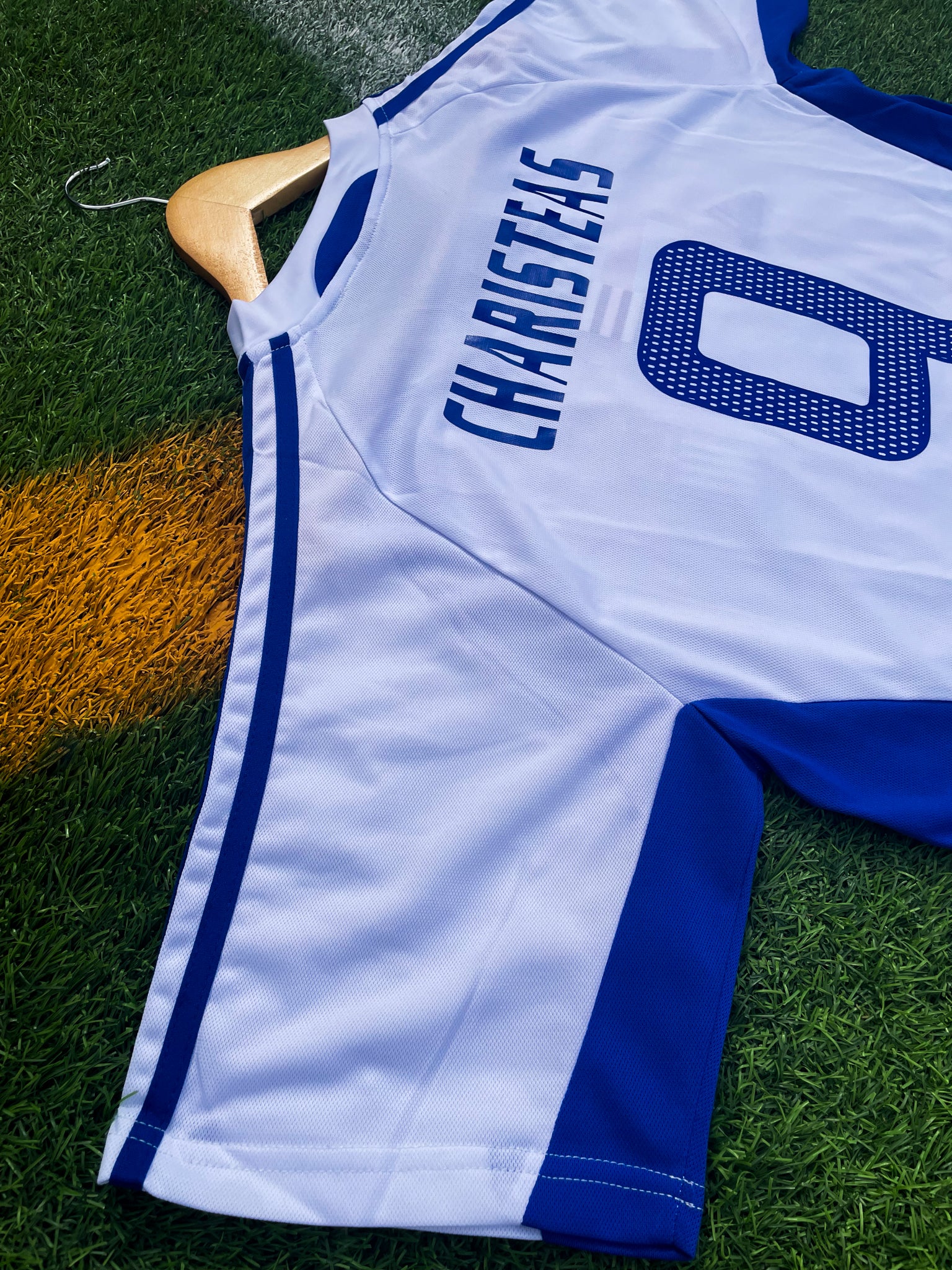 Back of the jersey featuring Charisteas #9

