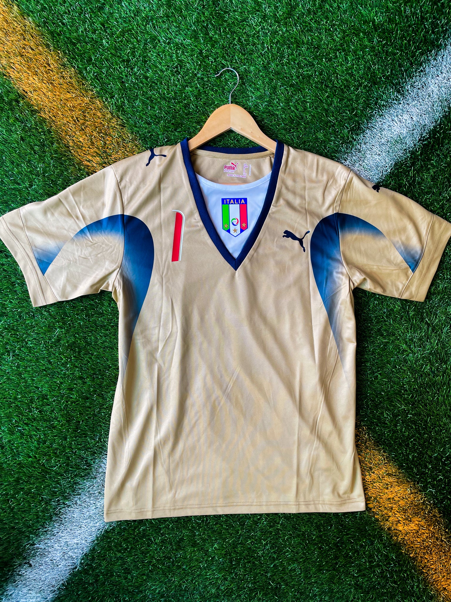 Front view of Italy 2006 goalkeeper jersey in green with crest

