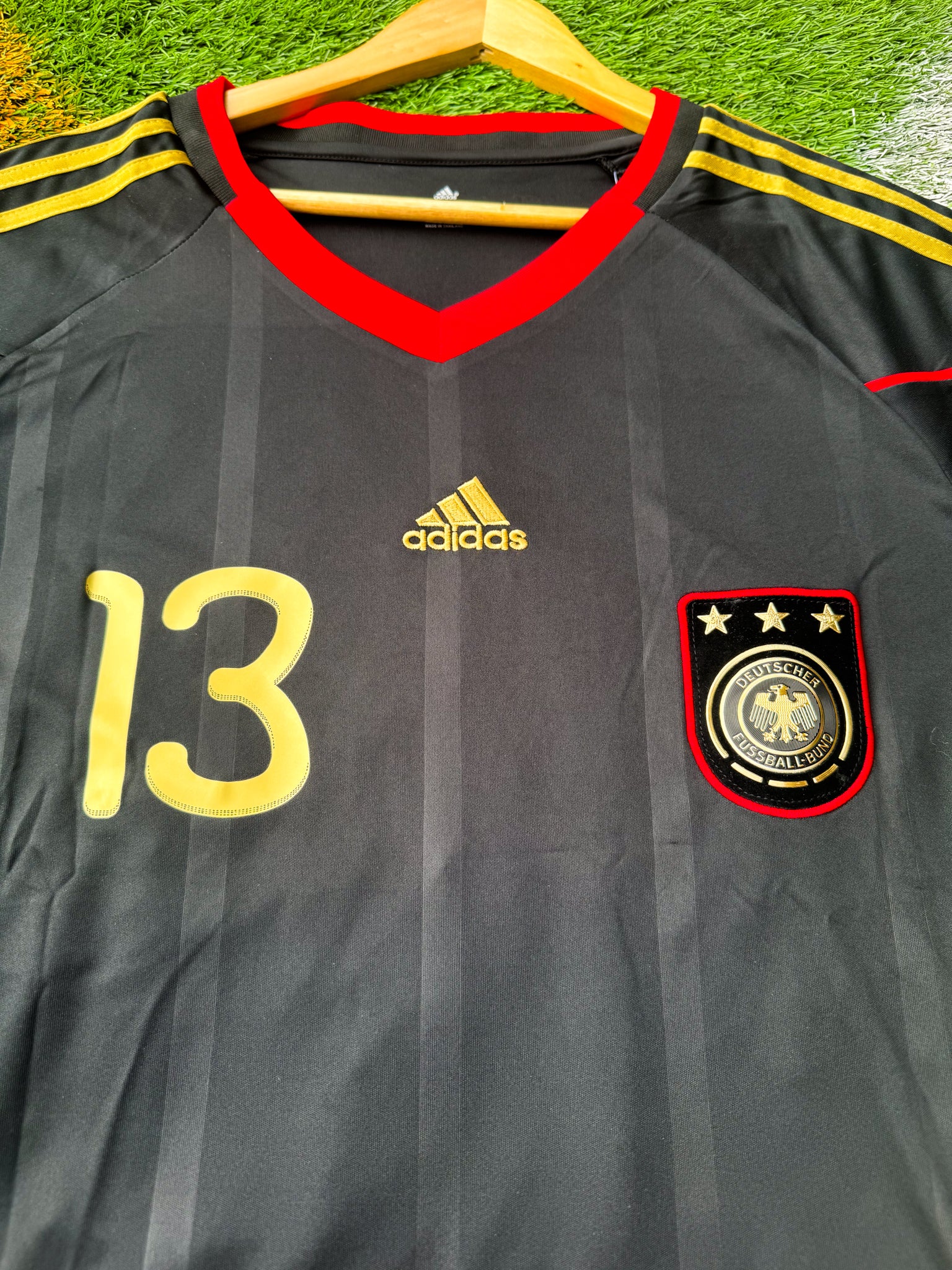 Close-up of Adidas logo and DFB crest

