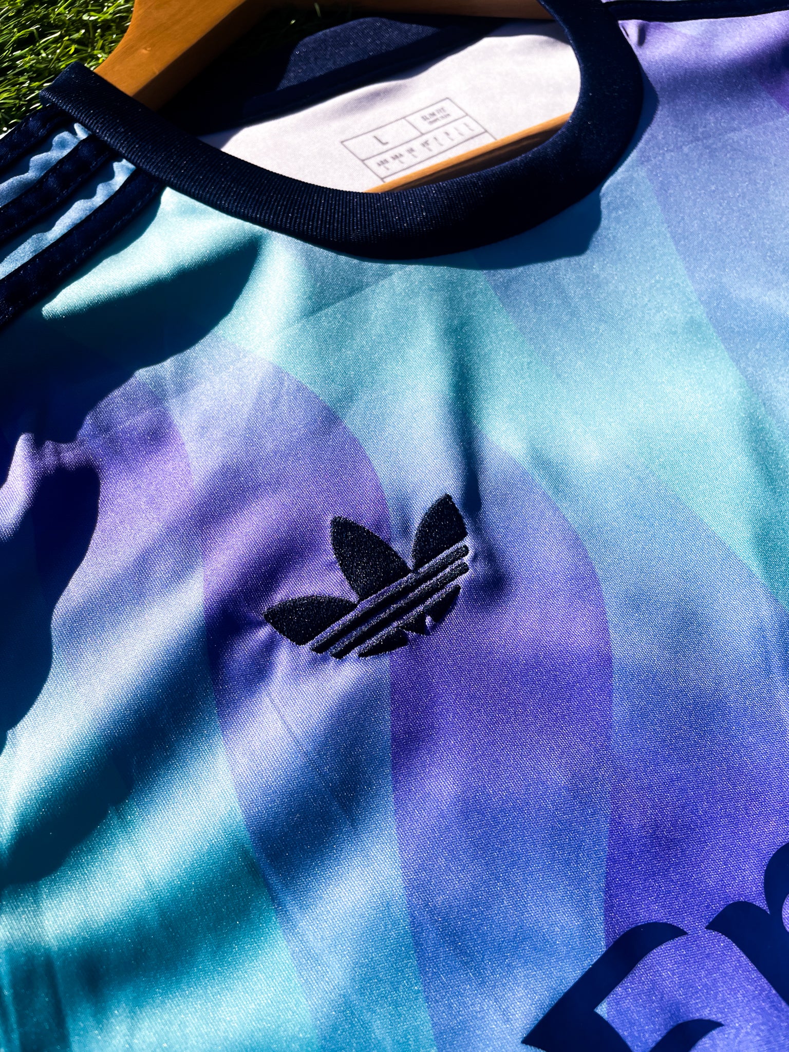 Close-up of Arsenal crest on the bold third kit design

