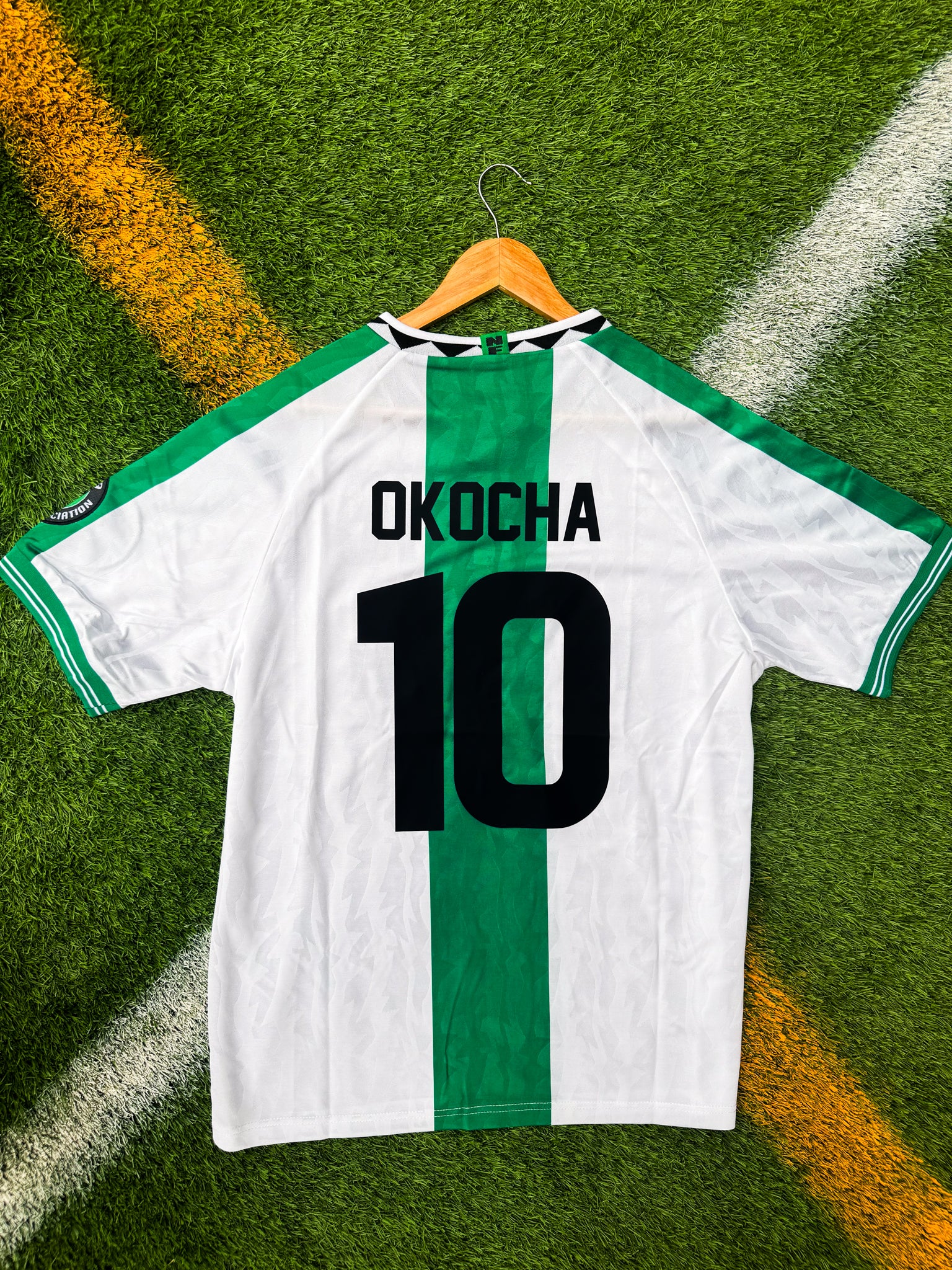 Back of jersey featuring Okocha #10


