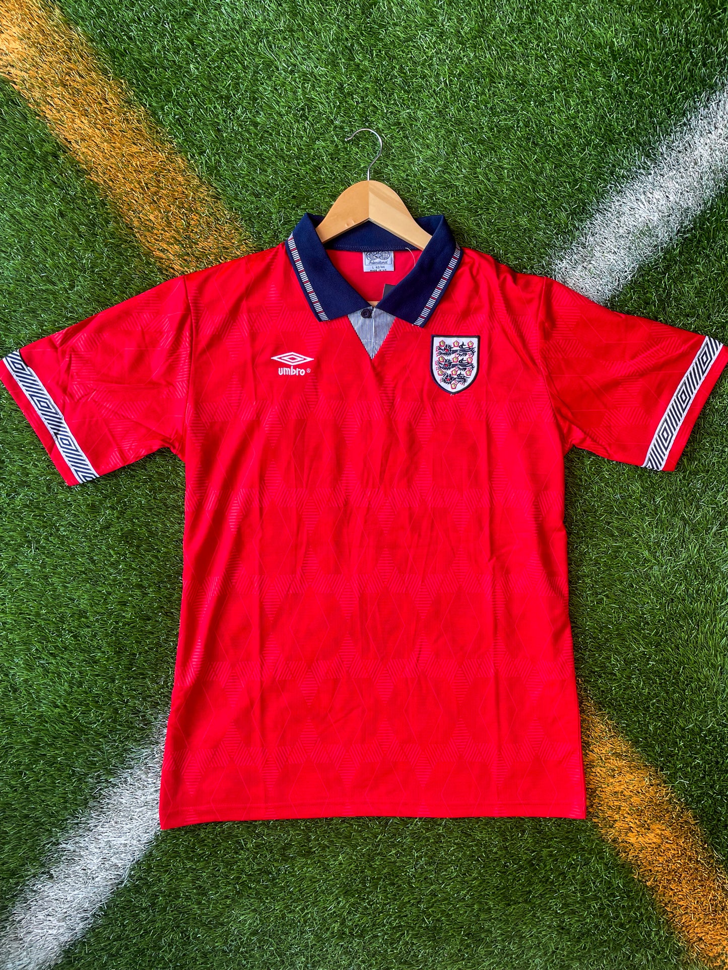 Front view of England 1994 Away Lineker #10 vintage red jersey.

