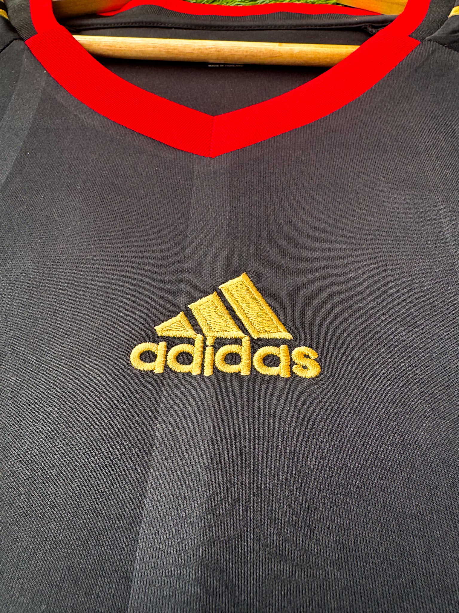 Close-up of Adidas logo and DFB crest

