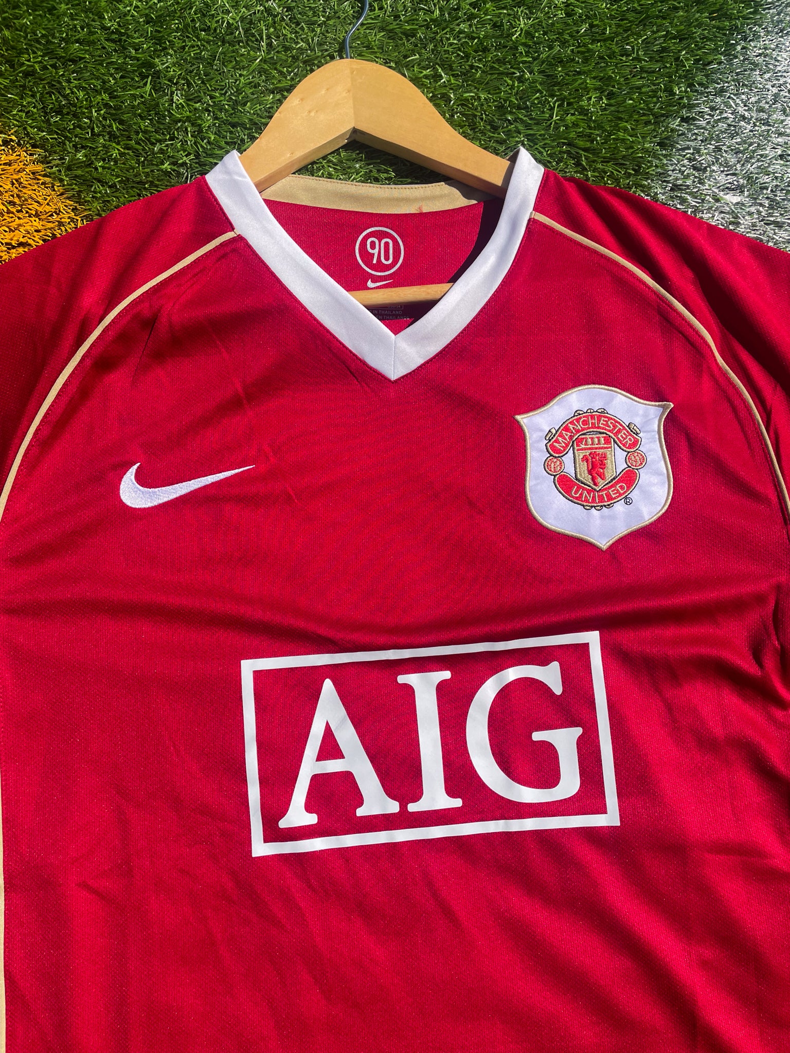 Close-up of Nike swoosh and embroidered crest

