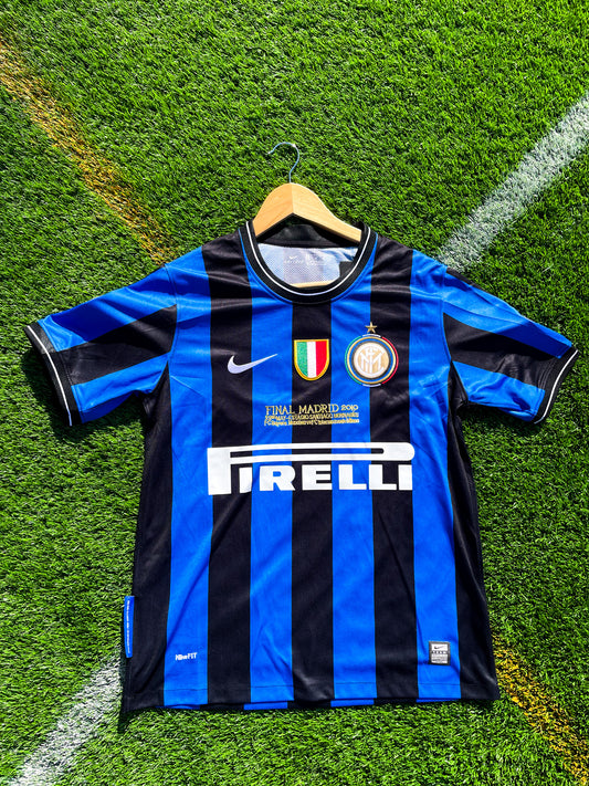 Front view of Inter Milan 2010-11 Home Jersey with black and blue stripes and Scudetto patch


