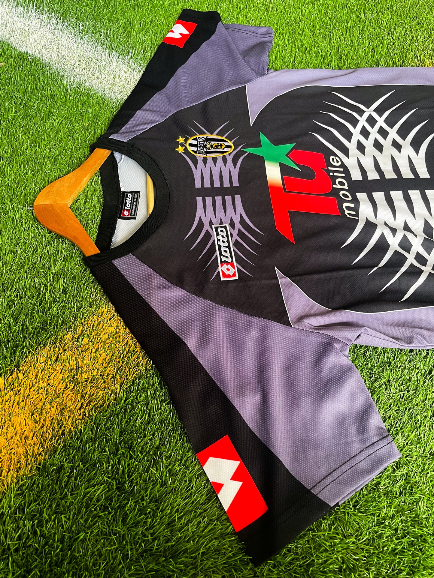 Close-up of Kappa logo and Juventus crest

