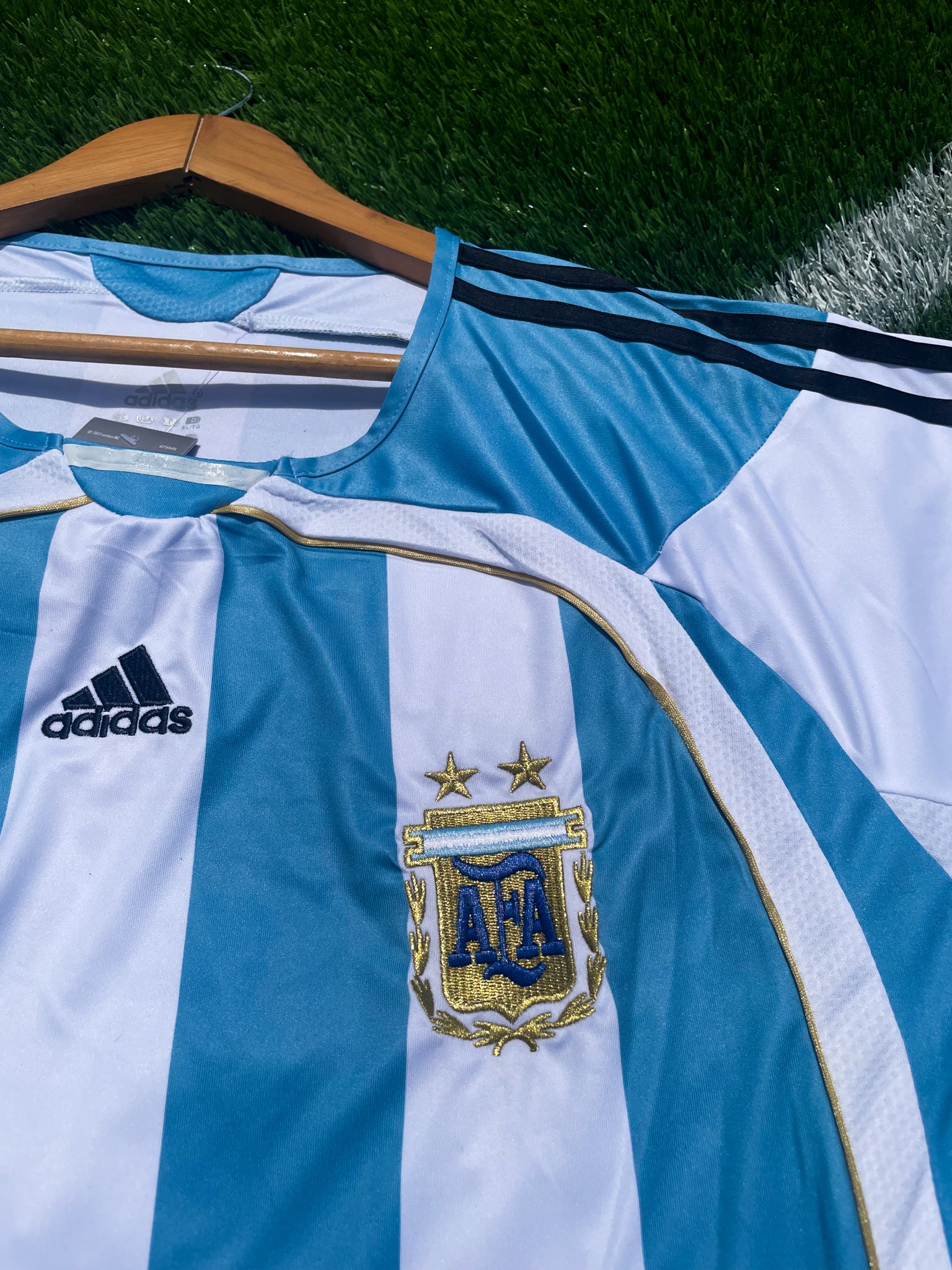 Close-up of embroidered AFA crest and adidas logo on the Argentina 2006 Home Jersey.
