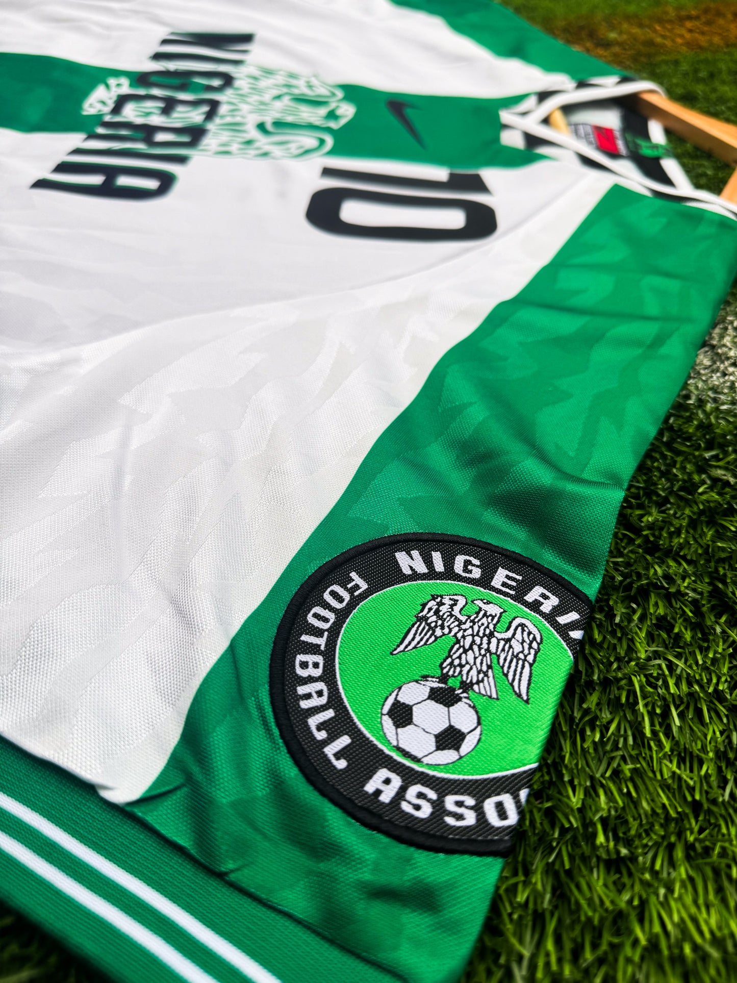 Detail of Super Eagles crest and vintage Nike logo

