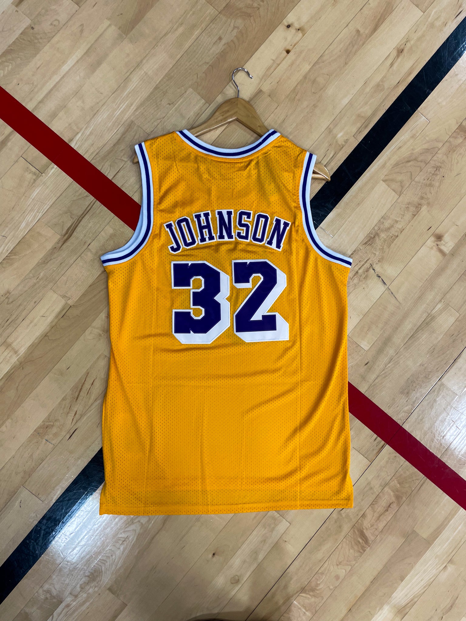 Back view showing Johnson name and number 32 on vintage Lakers jersey

