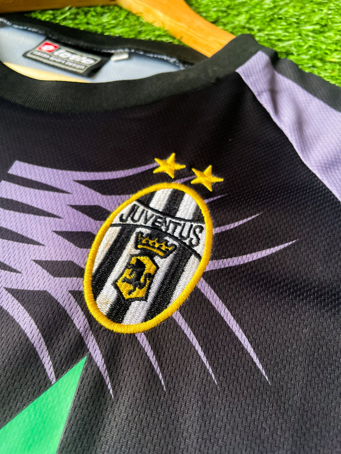 Close-up of Kappa logo and Juventus crest


