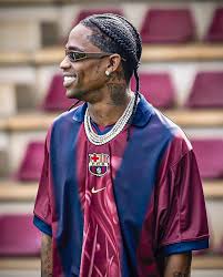 Travis Scott-inspired Barça home jersey styled on a streetwear background

